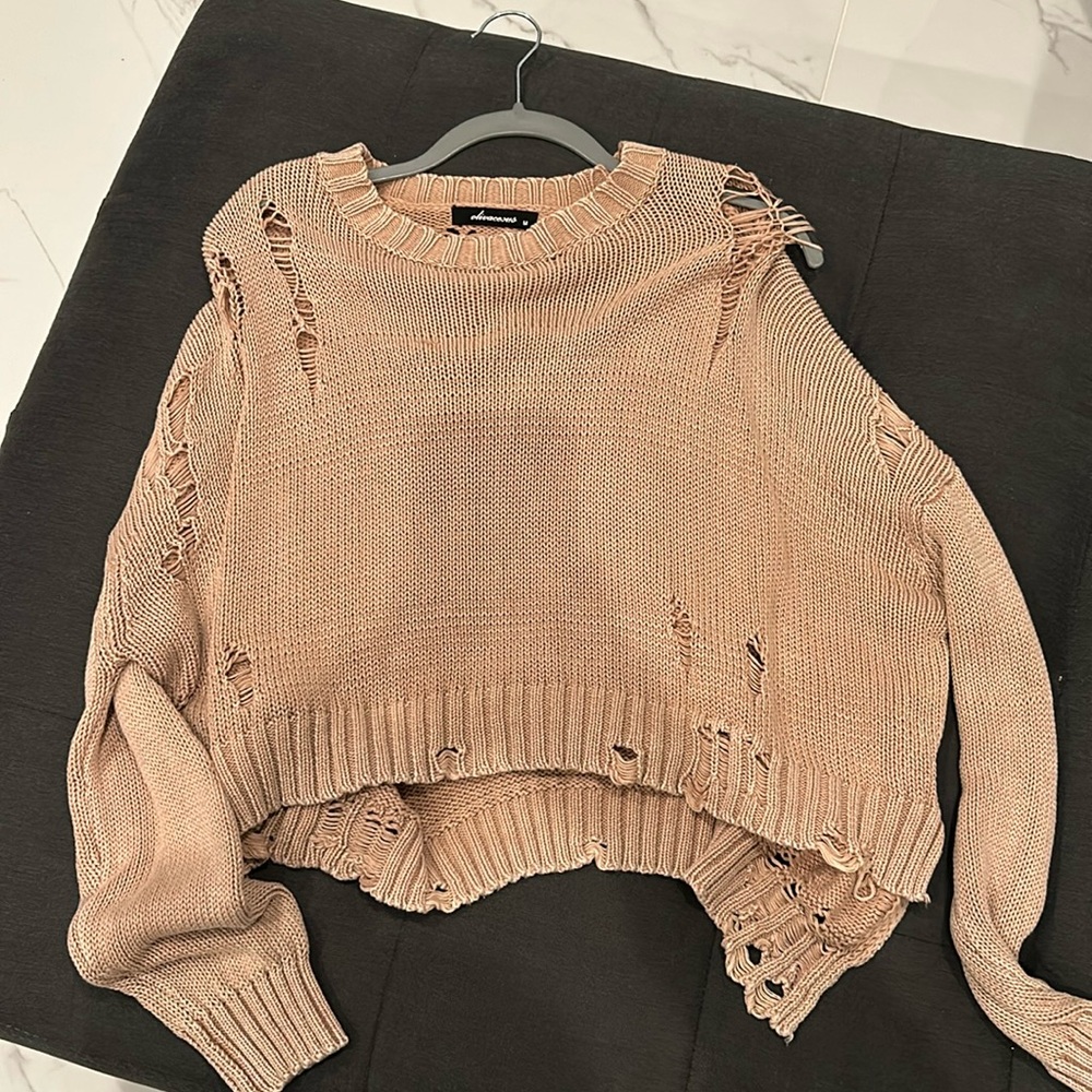 Tan ripped sweater from Vanilla Sky boutique